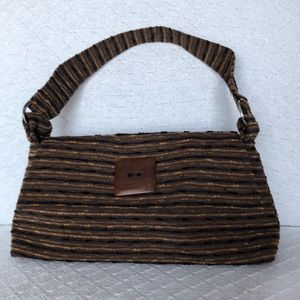 Dana Herbert purse. H 6 1/2 L 13 W 3